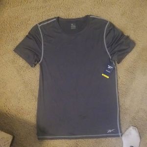 Reebok men's work out shirt.   Size Medium.  Super soft high performance fabric.